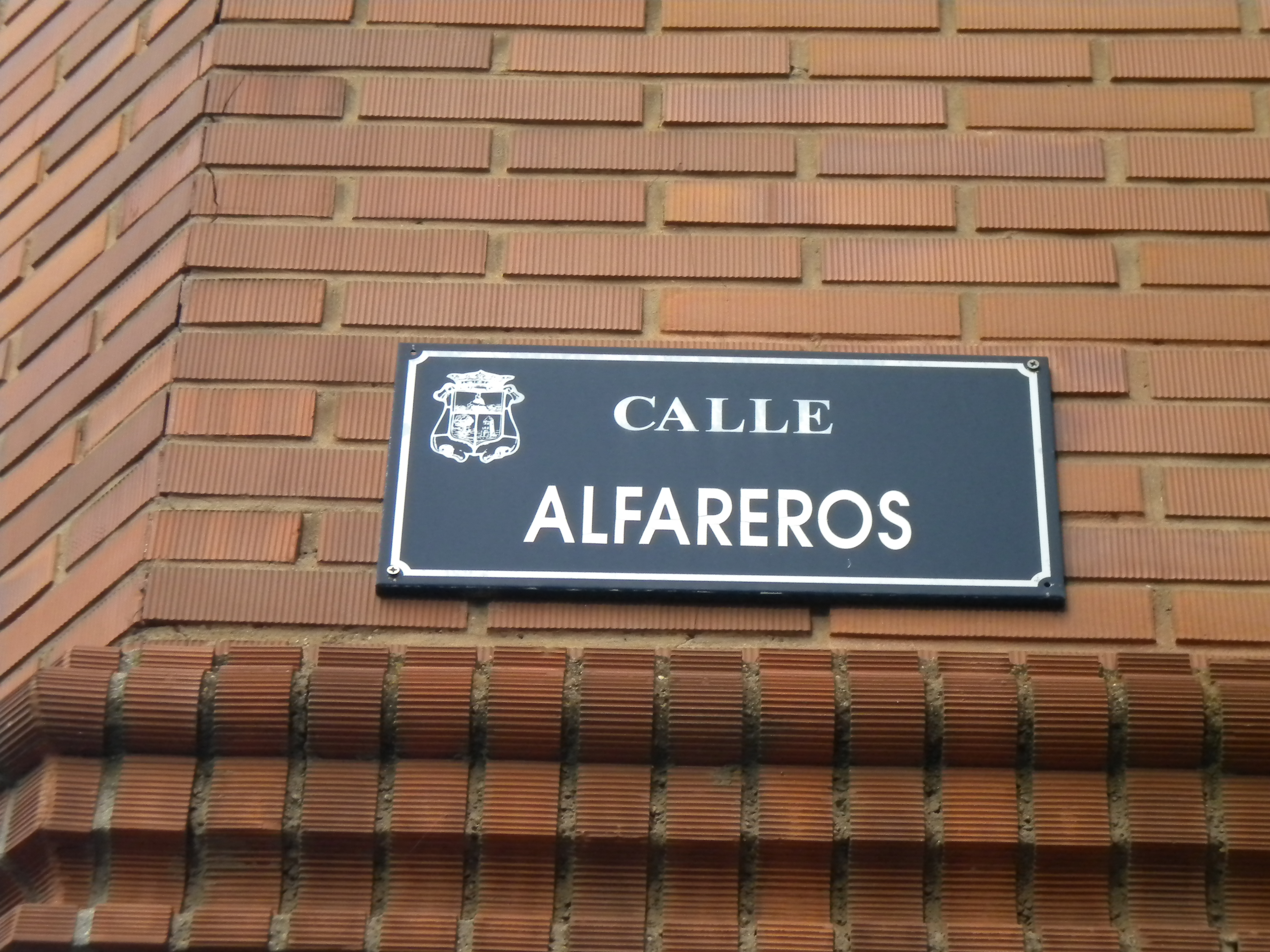 Placa de calle de oficios en La Bañeza