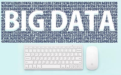 En la imagen se ve un ordenador con el texto Big Data en el monitor rodeado de símbolo